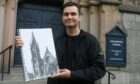 Andrii Brynza with an ink drawing of Gilcomston Church in Aberdeen. The Ukrainian hopes to go to Robert Gordon's University next semester.