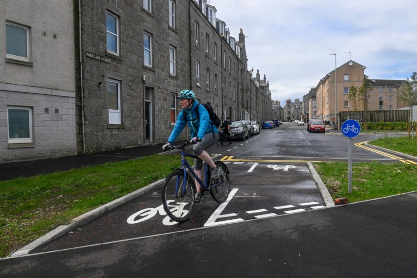 A cyclist on the new pedestrian and cyclist only road