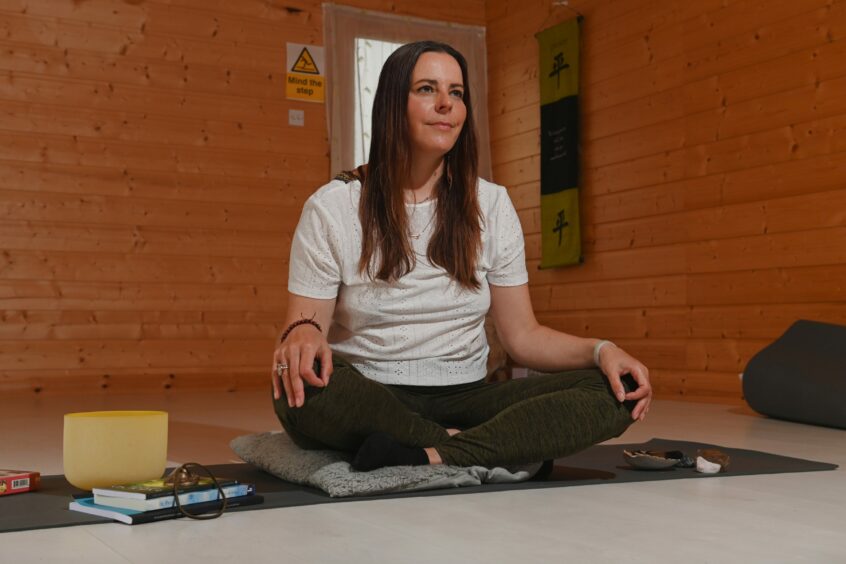 Susi meditating in her Aberdeenshire studio.