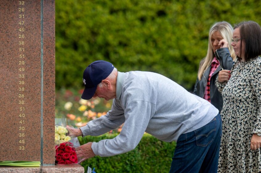 Another wreath is laid.