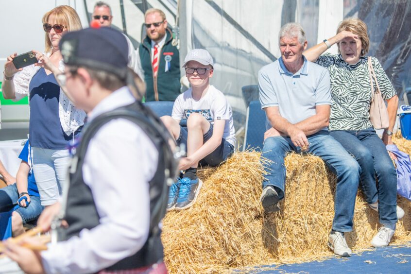 Visitors enjoying the Turriff and District Pipe Band.