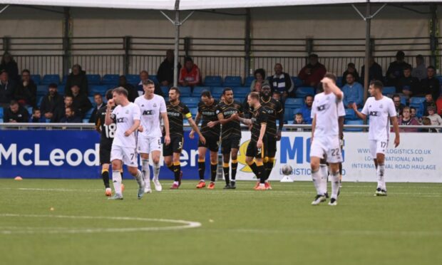 Livingston celebrate scoring their first in the eventual 4-0 win over Cove Rangers