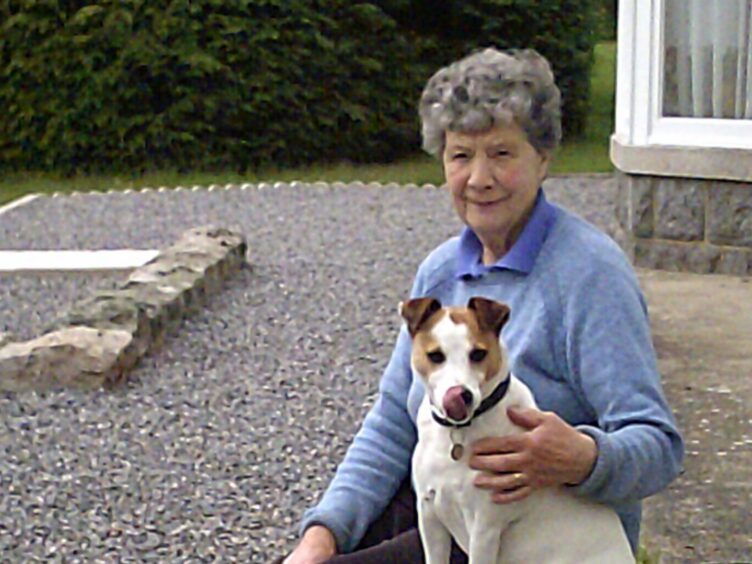 Owner of the Torphins home Maureen Anderson with her dog.