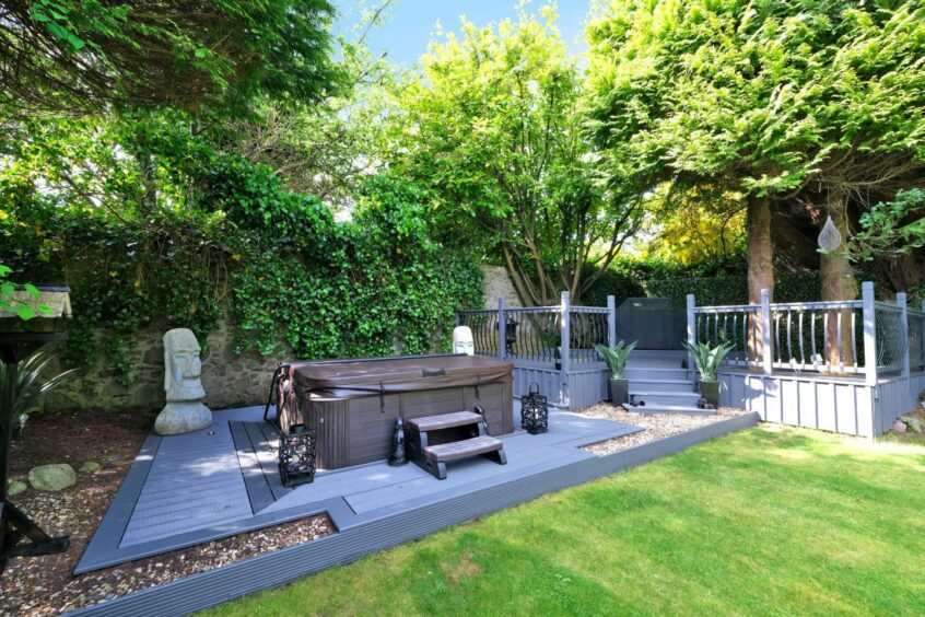 Hot tub in the back garden of the Aberdeen property.