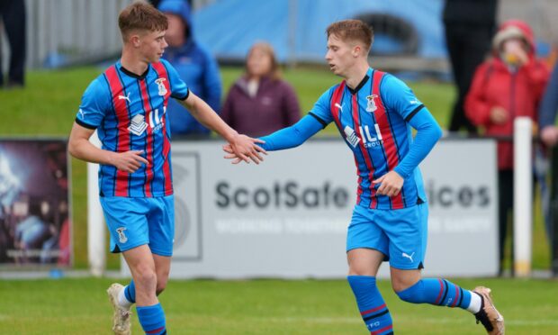 Adam Brooks, right, netted two swift goals for Inverness on his debut against Nairn County. Image: Jasperimage.