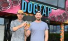 BrewDog co-founders Martin Dickie and James Watt, outside the DogTap bar at the firm's Ellon HQ.