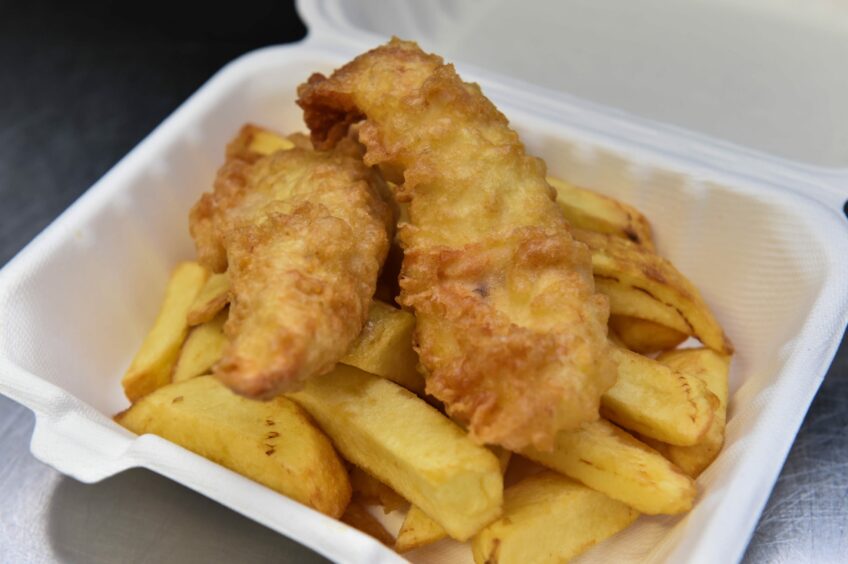 Chicken fillets and chips in a takeaway container from Redcloak Fish Bar