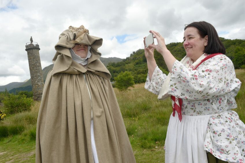 Jo Watson with Alex MacDougall who modelled her recreation of the Betty Burke servant disguise donned by Bonnie Prince Charlie during his escape to Skye.