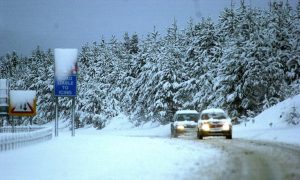 Cars driving in snow on A9