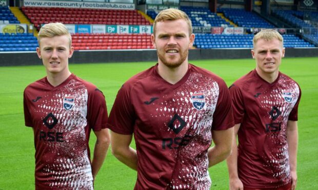 The new Ross County away kits were launched on Monday. Modelling the attire from left are: Kyle Turner, Scott Allardice and Josh Reid, who all joined the club this summer. Image: Ross County FC