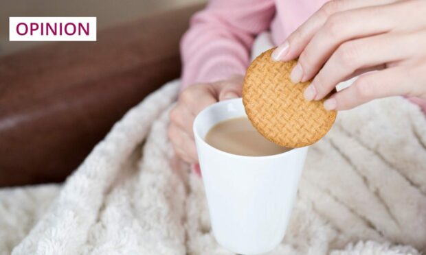Are the cups of tea getting bigger or the biscuits getting smaller? (Image: Juice Flair/Shutterstock)