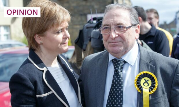 Former first minister Nicola Sturgeon and John McNally, who has announced he will step down as an MP, pictured in 2017 (Image: Robert Perry/Shutterstock)