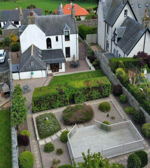 An aerial view of the back of the house and the back garden