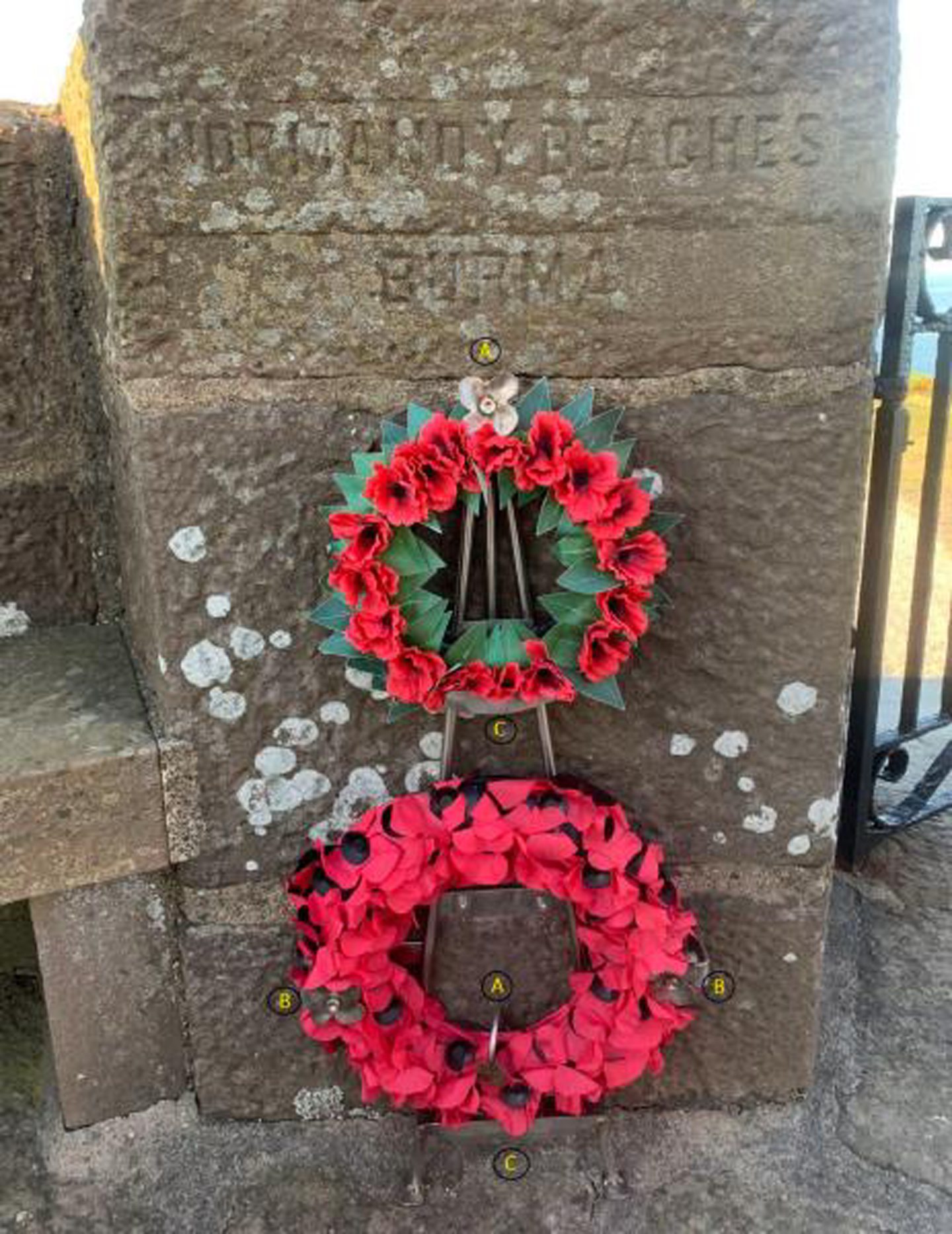 Some of the brackets affixed to the war memorial