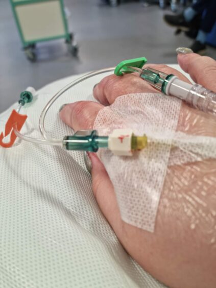 Amanda's IV drips during cancer treatment.