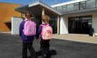 Two pupils head to Heathryburn School in Northfield. Image: Colin Rennie/DC Thomson