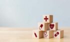 Wood block stacking with icon healthcare medical, concept