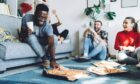 A group of people enjoying some takeaway food.