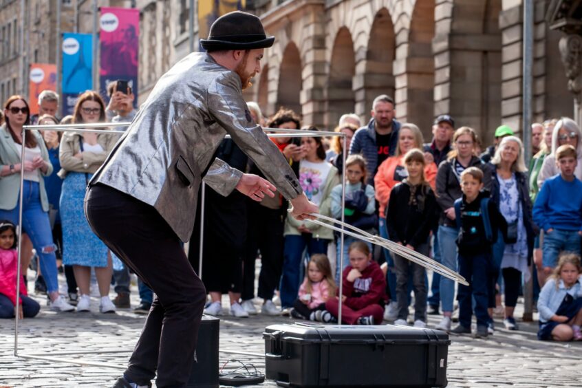 Street performers are all part of the show at the Edinburgh Festival Fringe