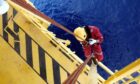 Offshore worker  using rope access for piping inspection. Image: Shutterstock