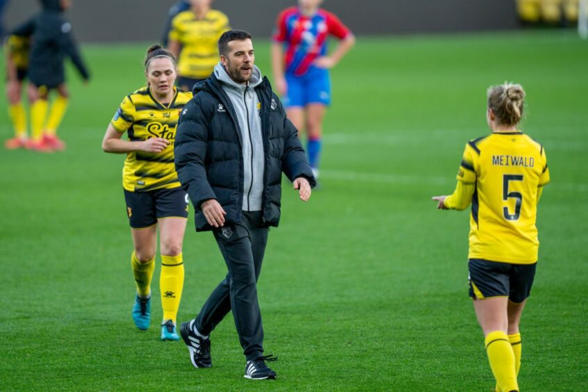 Clinton Lancaster on the pitch in his time as Watford Women's manager in the English second tier. 