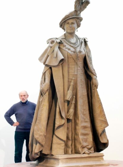 Philip with his sculpture of Queen Elizabeth, The Queen Mother. 