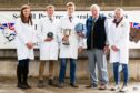 To go with story by Katrina Macarthur. The intermediate section was won by Gregor Milne from Kennieshillock Picture shows; The intermediate winners . Towcester in Northamptonshire.. Supplied by British Charolais Cattle Society Date; 18/07/2023