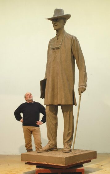 Philip Jackson with his statue of Colin Tennant, Lord Glenconner. 