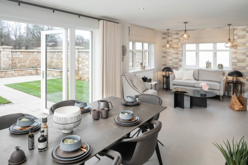 Modern living and dining room inside Southbank by Cala's Cleland showhome.