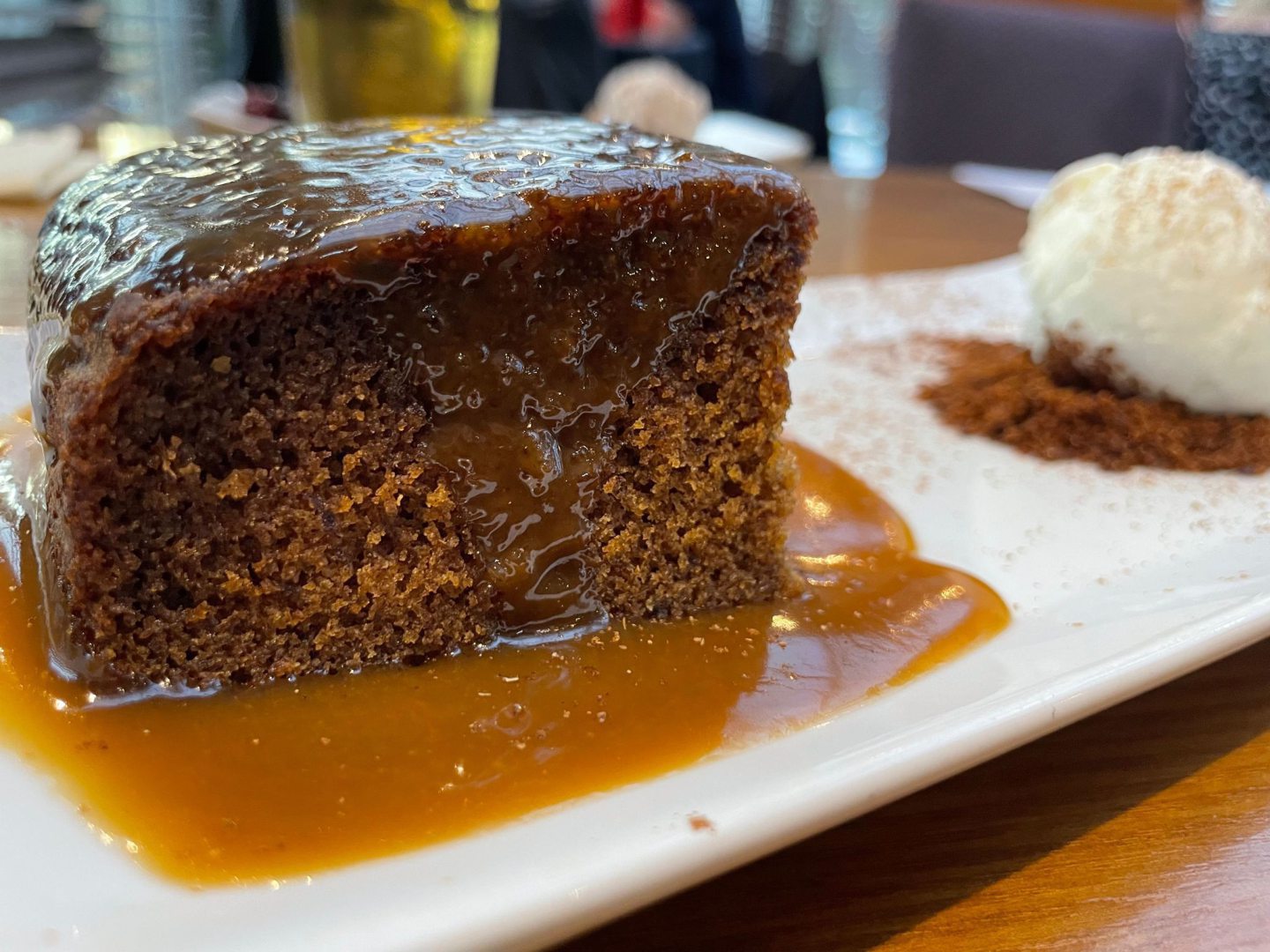 sticky toffee pudding with a scoop of vanilla ice cream from Ferryhill House Hotel, available during Aberdeen Restaurant Week
