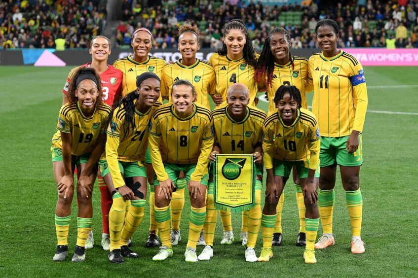 Jamaica team members pose for a team photo at the Women's World Cup.