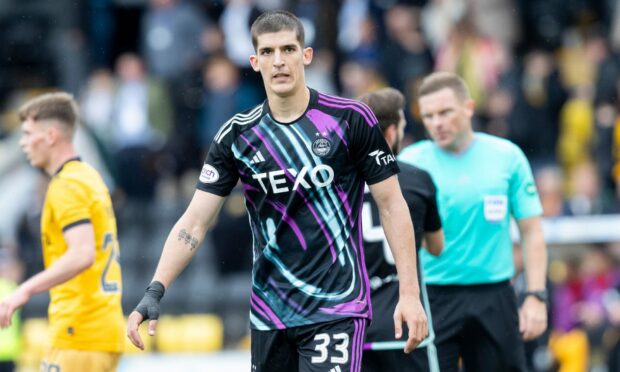 New Aberdeen signing Slobodan Rubezic in action on his debut against Livingston. Image: Shutterstock.