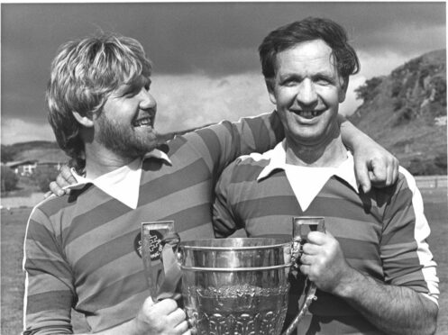 Donnie Grant and son Ross winning the Camanachd cup in 1984. The first father and son combo to do so.