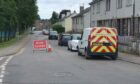 Cones and signs have been erected along North Street in New Elgin due to a sinkhole.