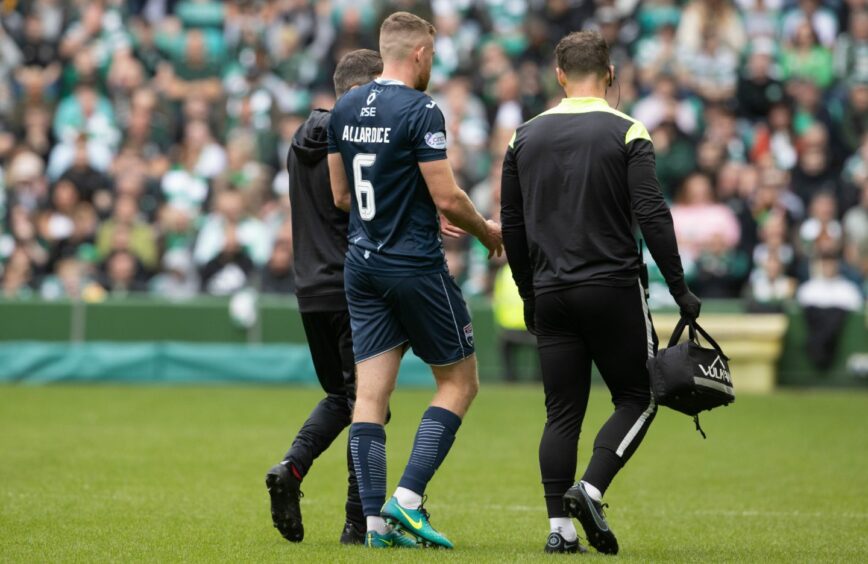 Scott Allardice leaving the pitch after he injured his knee against Celtic on the opening afternoon of the season