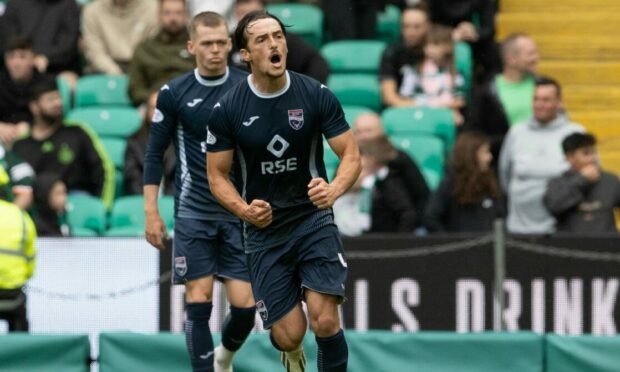 Ross County's James Brown celebrates after making it 4-2 against Celtic. Image: SNS.