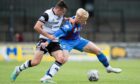Inverness' Luis Longstaff and Ayr's Patrick Reading tussle for possession. Image: SNS.