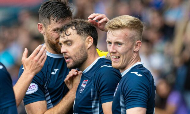 Ross County goalscorers Connor Randall and Kyle Turner celebrate during the victory over St Johnstone. Image: SNS.
