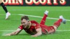 Aberdeen's Nicky Devlin celebrates after making it 2-2 against BK Hacken. Image: SNS.