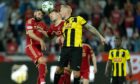 BK Hacken's Mikkel Rygaard and Aberdeen's Graeme Shinnie and James McGarry during Thursday's Europa League play-off first leg match in Gothenburg. Image: SNS.