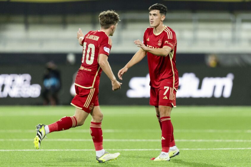 Aberdeen's Leighton Clarkson and Jamie McGrath on the pitch against BK Hacken to reach the Europa league group stages