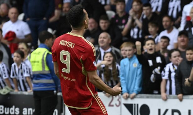 Aberdeen striker Bojan Miovski celebrates after scoring a dramatic late leveller against St Mirren. Image; SNS.