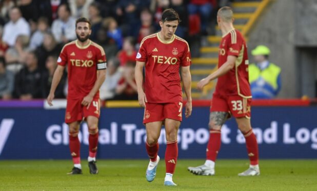 Aberdeen's Jamie McGrath looks dejected during the Europa League play-off clash with BK Hacken. Image: SNS
