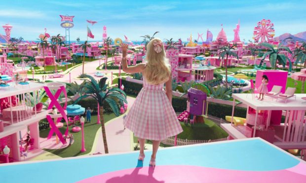 Barbie (Margot Robbie) looking out at Barbie Land