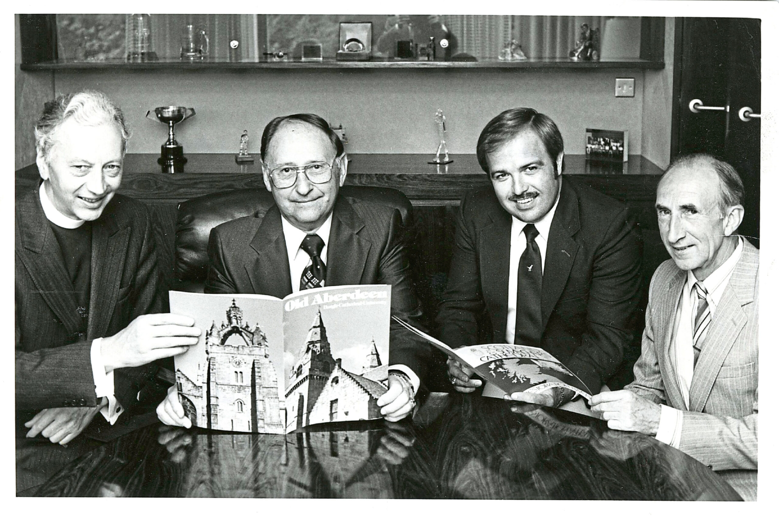 Conoco managers Charles Ellis, second left, and Bob Ireland, second right, present a £2,000cheque to St Machar’s Cathedral’s restoration fund in 1983.