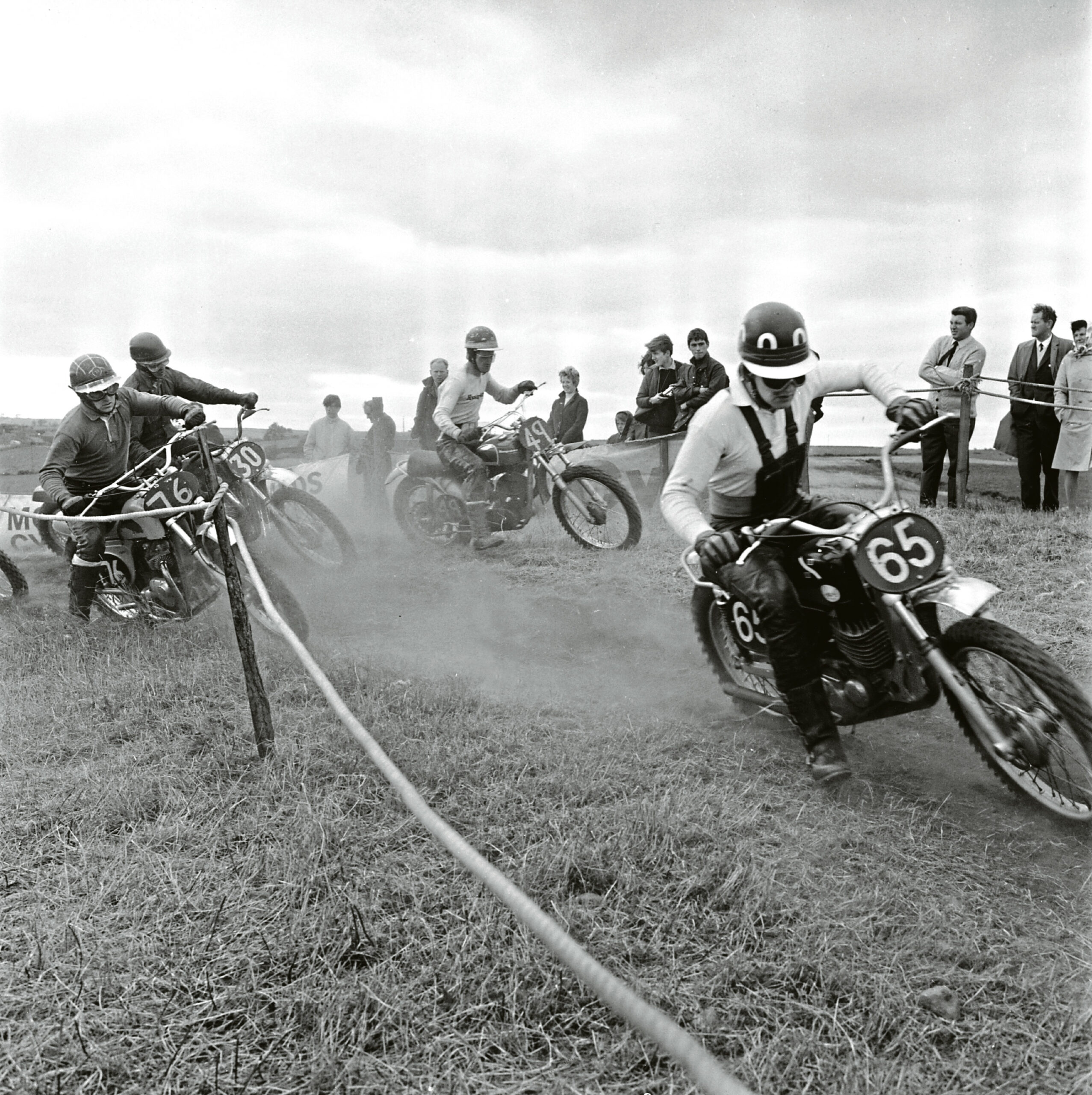 A competitor takes a corner in front of spectators at the Bon Accord Motor Cycle Club scramble in Aberdeen in August 1969.