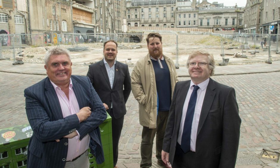 Picture shows Allan Henderson, director of The McGinty's Group, councillor Ian Yuill, councillor Alex McLellan and Martin Widerlechner, marketing and sales manager, at the Aberdeen market construction site.