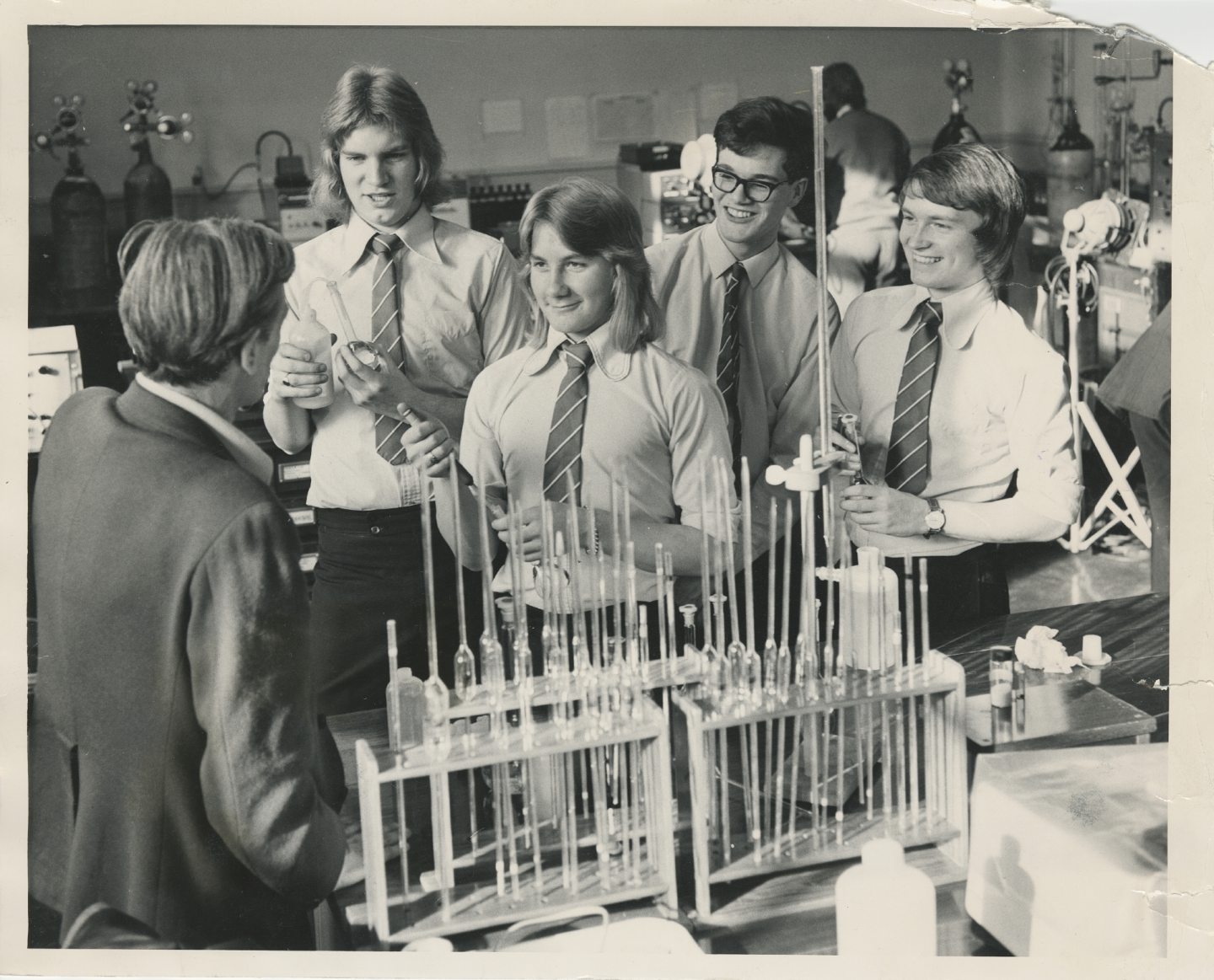BBC producer Peter Bruce speaks to the school's young science team in 1974.