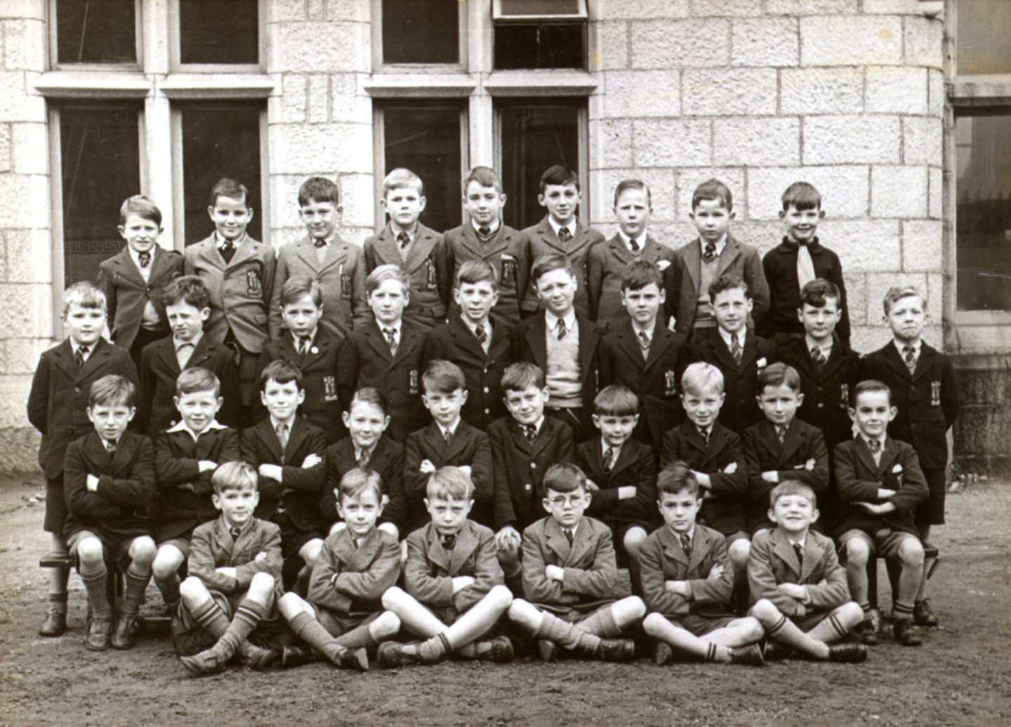 Young boys at Aberdeen Grammar School pose for a class photo in the 1940s.