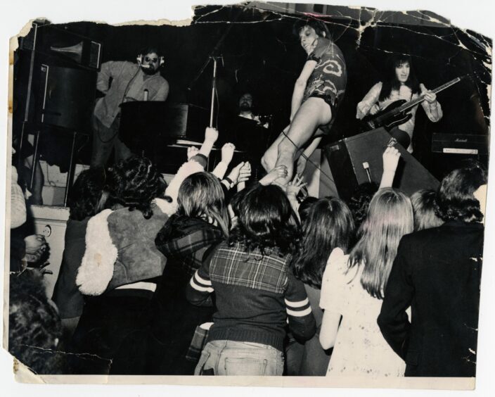 Fan frenzy as David Bowie is on stage during Ziggy Stardust tour at Aberdeen Music Hall in 1973.